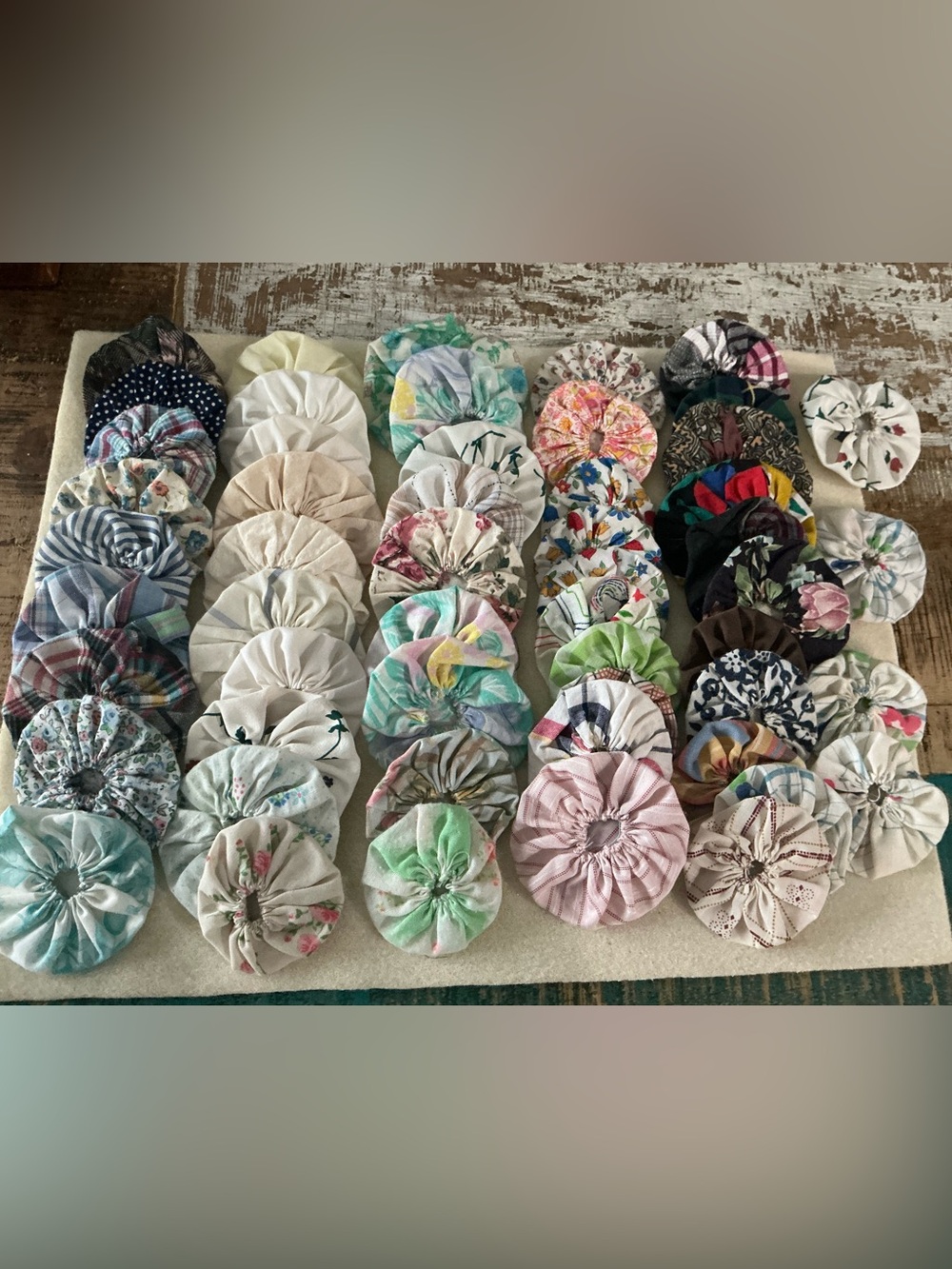 Handmade vintage Fabric Yo-Yo Quilt Pieces, total of 50!